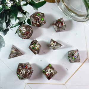 A holiday special event, this polyhedral double-pour is chock full of snowflakes and red,green, and silver glitter. Finished with shiny, white ink, these are perfect for your holiday campaigns!